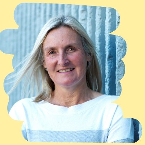 Leigh smiling in to the camera
