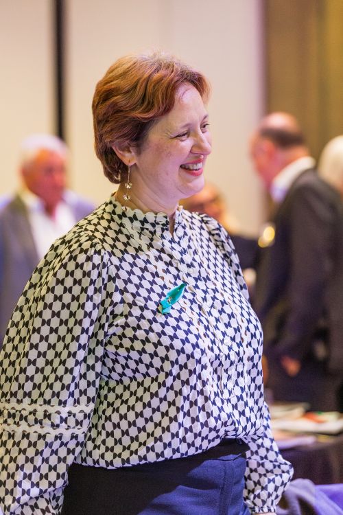 Woman smiling at the event