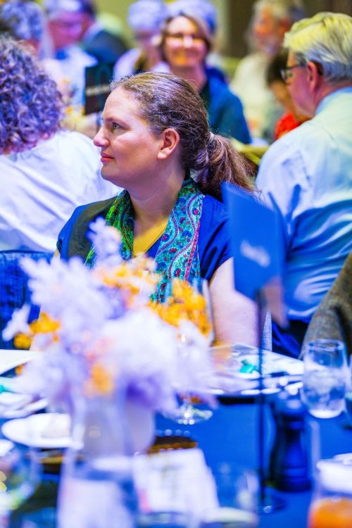 Woman sitting at a table